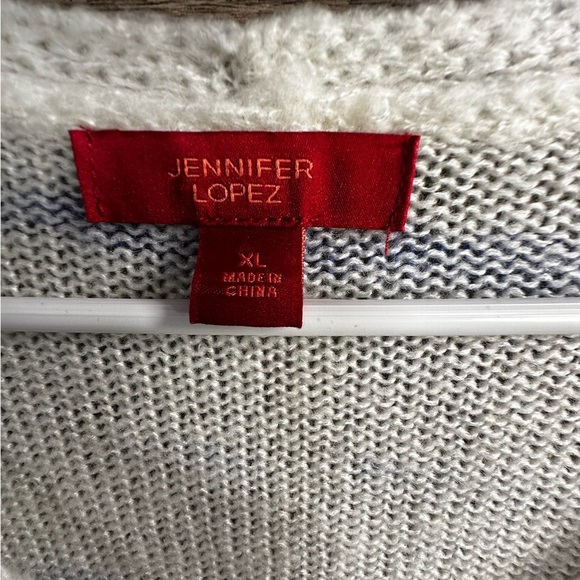 Jennifer Lopez White and Blue V-Neck Sweater with Artistic Stripes - Picture 7 of 7